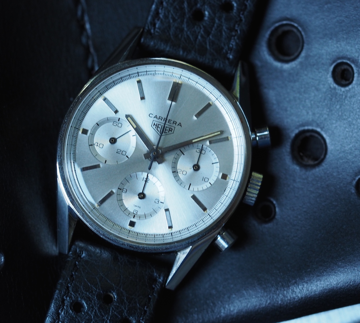 The Heuer Carrera 2447S has an angled inner bezel